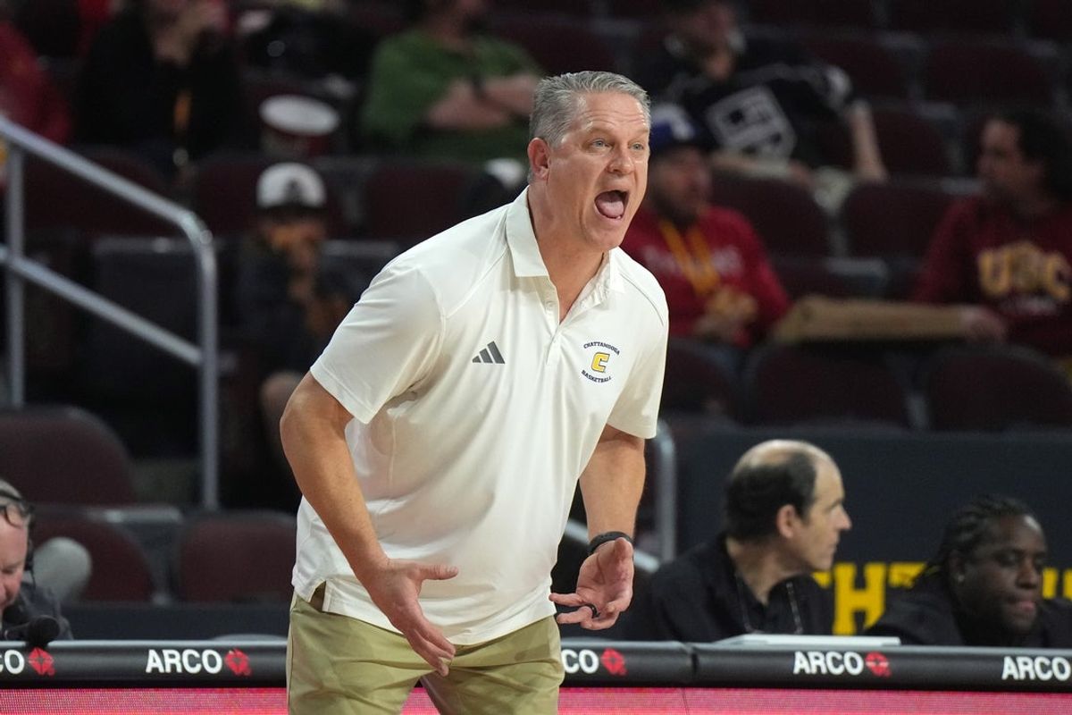 Nov 4, 2024; Los Angeles, California, USA; Chattanooga Mocs head coach Dan Earl reacts against the Southern California Trojans in the first half at Galen Center. Mandatory Credit: Kirby Lee-Imagn Images