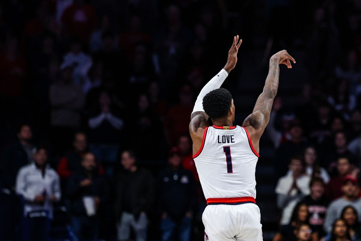 Nov 4, 2024; Tucson, Arizona, USA; Arizona Wildcats guard Caleb Love (1) attempts to shoot a three-point shot against Canisius Golden Griffins during the first half at McKale Center. Mandatory Credit: Aryanna Frank-Imagn Images