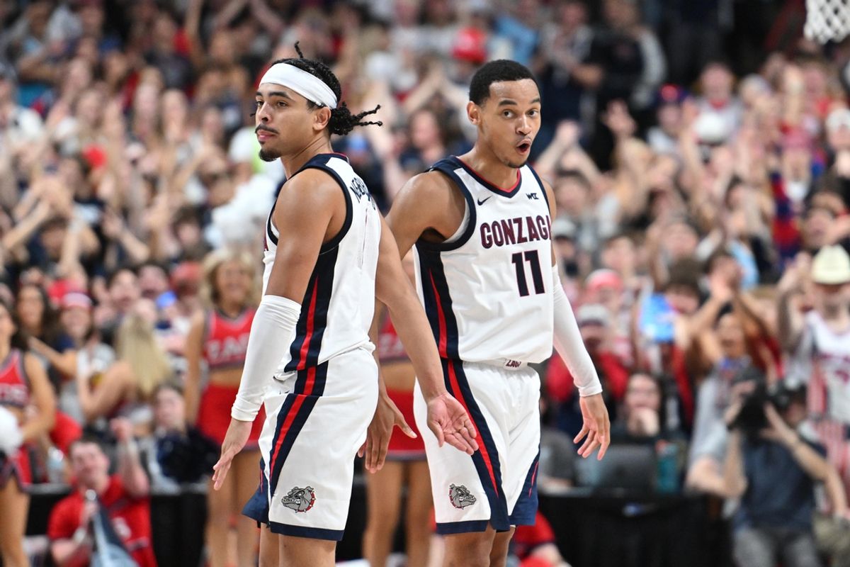 Nov 4, 2024; Spokane, Washington, USA; Gonzaga Bulldogs guard Nolan Hickman (11) and guard Ryan Nembhard (0) celebrate a three-point basket against the Baylor Bears in the second half at Spokane Arena. Mandatory Credit: James Snook-Imagn Images