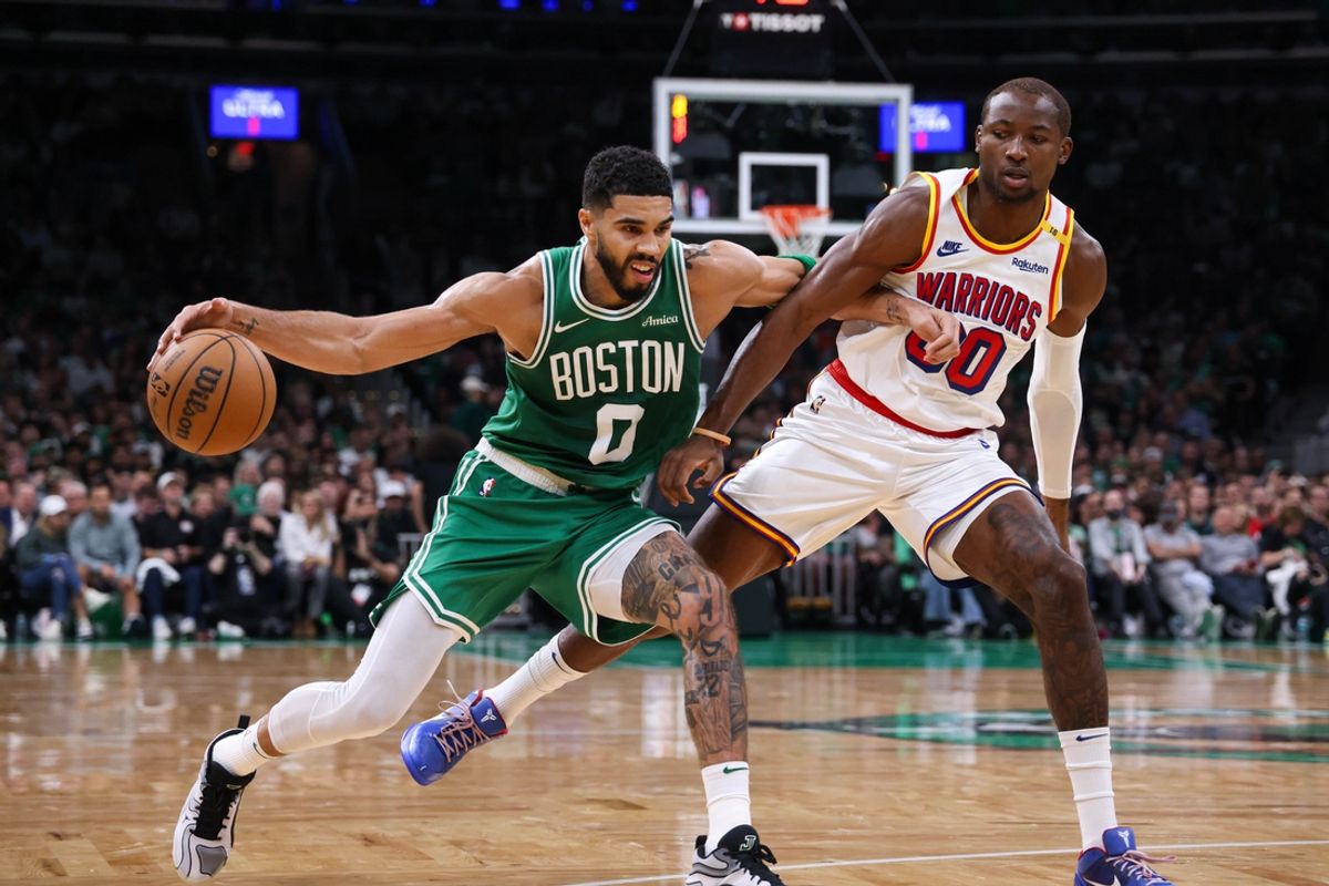 Nov 6, 2024; Boston, Massachusetts, USA; Boston Celtics forward Jayson Tatum (0) drives to the basket during the first half against the Golden State Warriors at TD Garden. Mandatory Credit: Paul Rutherford-Imagn Images