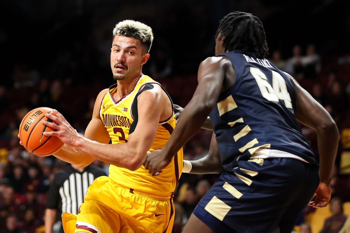 Nov 6, 2024; Minneapolis, Minnesota, USA; Minnesota Golden Gophers forward Dawson Garcia (3) works around Oral Roberts Golden Eagles forward Sam Alajiki (64) during the first half at Williams Arena. Mandatory Credit: Matt Krohn-Imagn Images