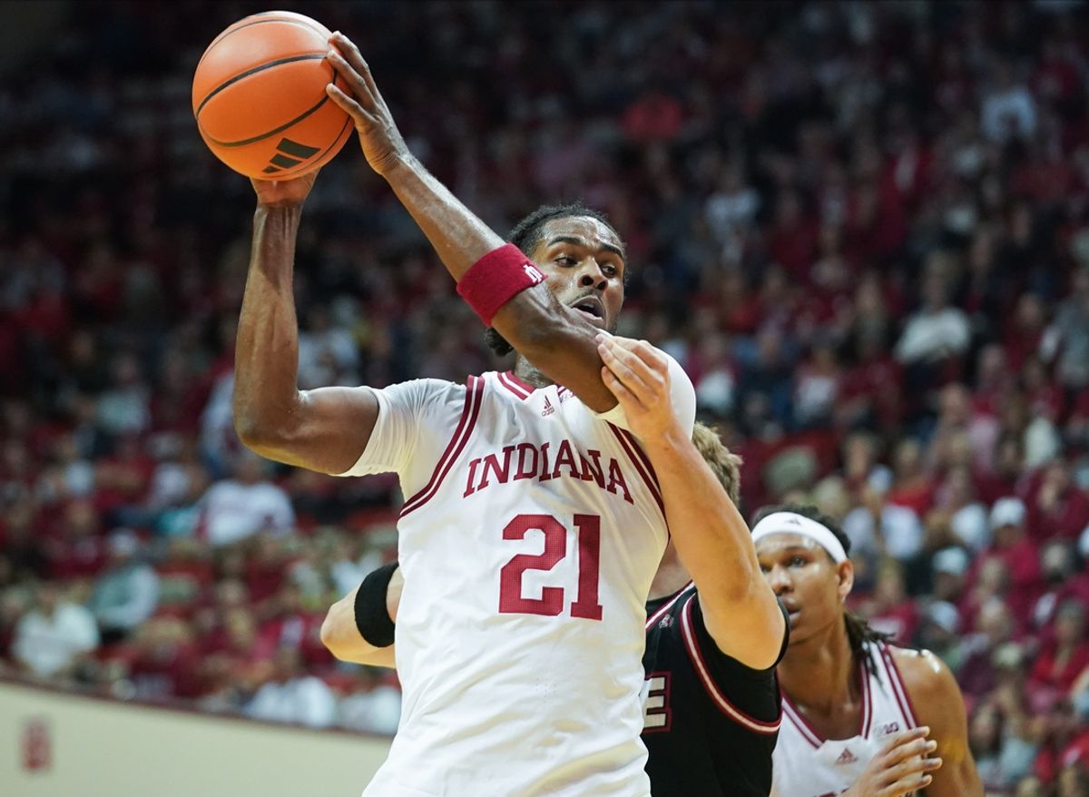 Nov 6, 2024; Bloomington, Indiana, USA; Indiana Hoosiers forward Mackenzie Mgbako (21) rebounds the ball during the first half against the SIU Edwardsville Cougars at Simon Skjodt Assembly Hall. Mandatory Credit: Robert Goddin-Imagn Images