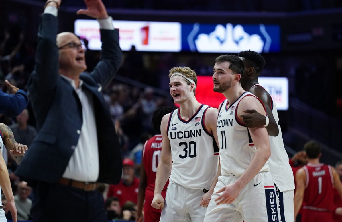 Nov 6, 2024; Storrs, Connecticut, USA; Connecticut Huskies forward Liam McNeeley (30), forward Alex Karaban (11) and Connecticut Huskies head coach Dan Hurley react after a play against the Sacred Heart Pioneers in the second half at Harry A. Gampel Pavilion. Mandatory Credit: David Butler II-Imagn Images