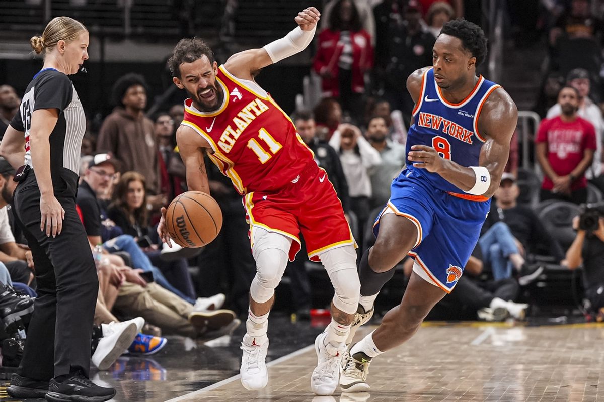 Nov 6, 2024; Atlanta, Georgia, USA; Atlanta Hawks guard Trae Young (11) is sent out of bounds by New York Knicks forward OG Anunoby (8) during the second half at State Farm Arena. Mandatory Credit: Dale Zanine-Imagn Images