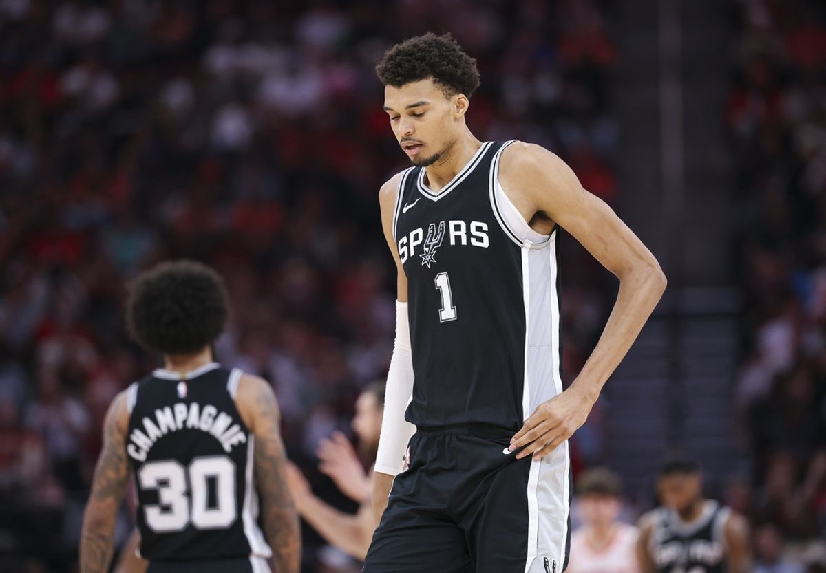 Nov 6, 2024; Houston, Texas, USA; San Antonio Spurs center Victor Wembanyama (1) reacts during the fourth quarter against the Houston Rockets at Toyota Center. Mandatory Credit: Troy Taormina-Imagn Images