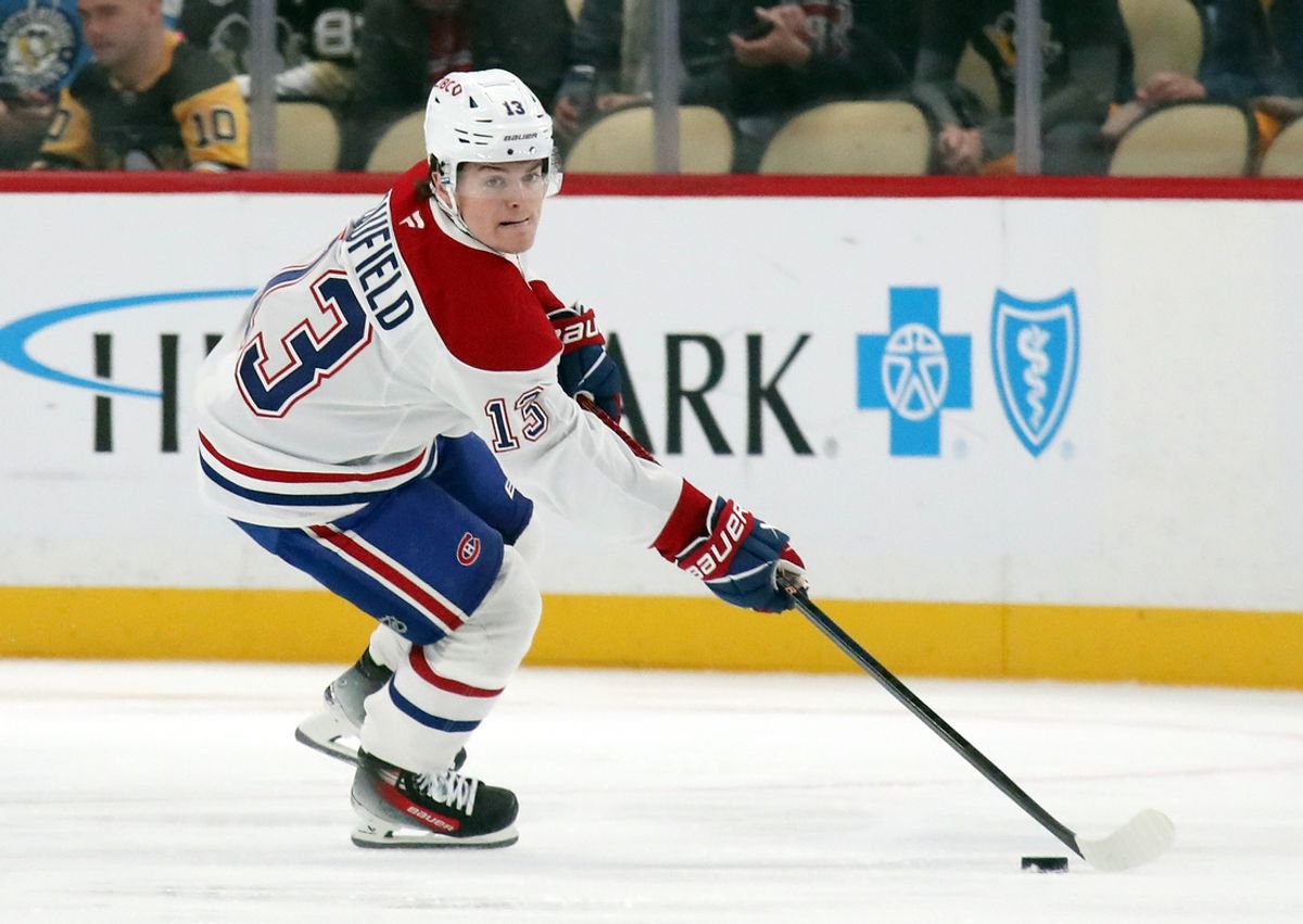 Nov 2, 2024; Pittsburgh, Pennsylvania, USA;  Montreal Canadiens right wing Cole Caufield (13) moves the puck up ice against the Pittsburgh Penguins during the second period at PPG Paints Arena. Mandatory Credit: Charles LeClaire-Imagn Images