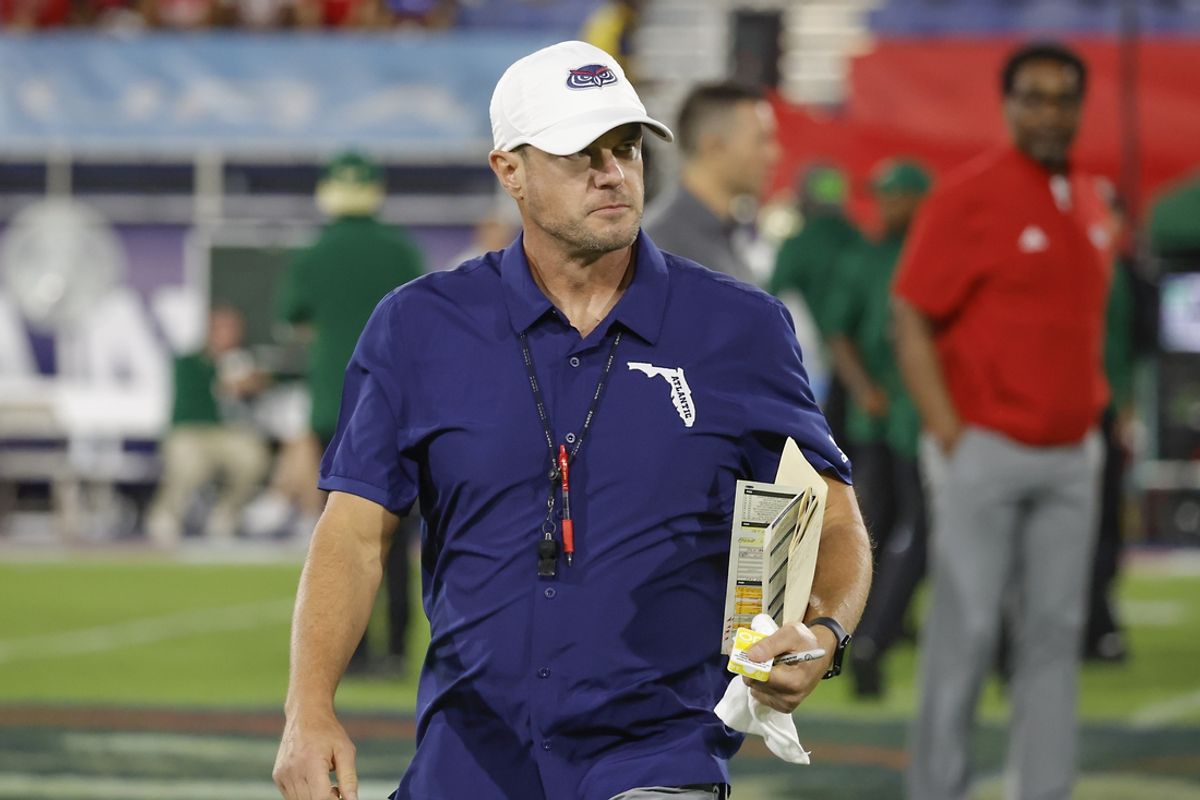 Nov 1, 2024; Boca Raton, Florida, USA;  Florida Atlantic Owls head coach Tom Herman walks on the field before the game against the South Florida Bulls at FAU Stadium. Mandatory Credit: Reinhold Matay-Imagn Images