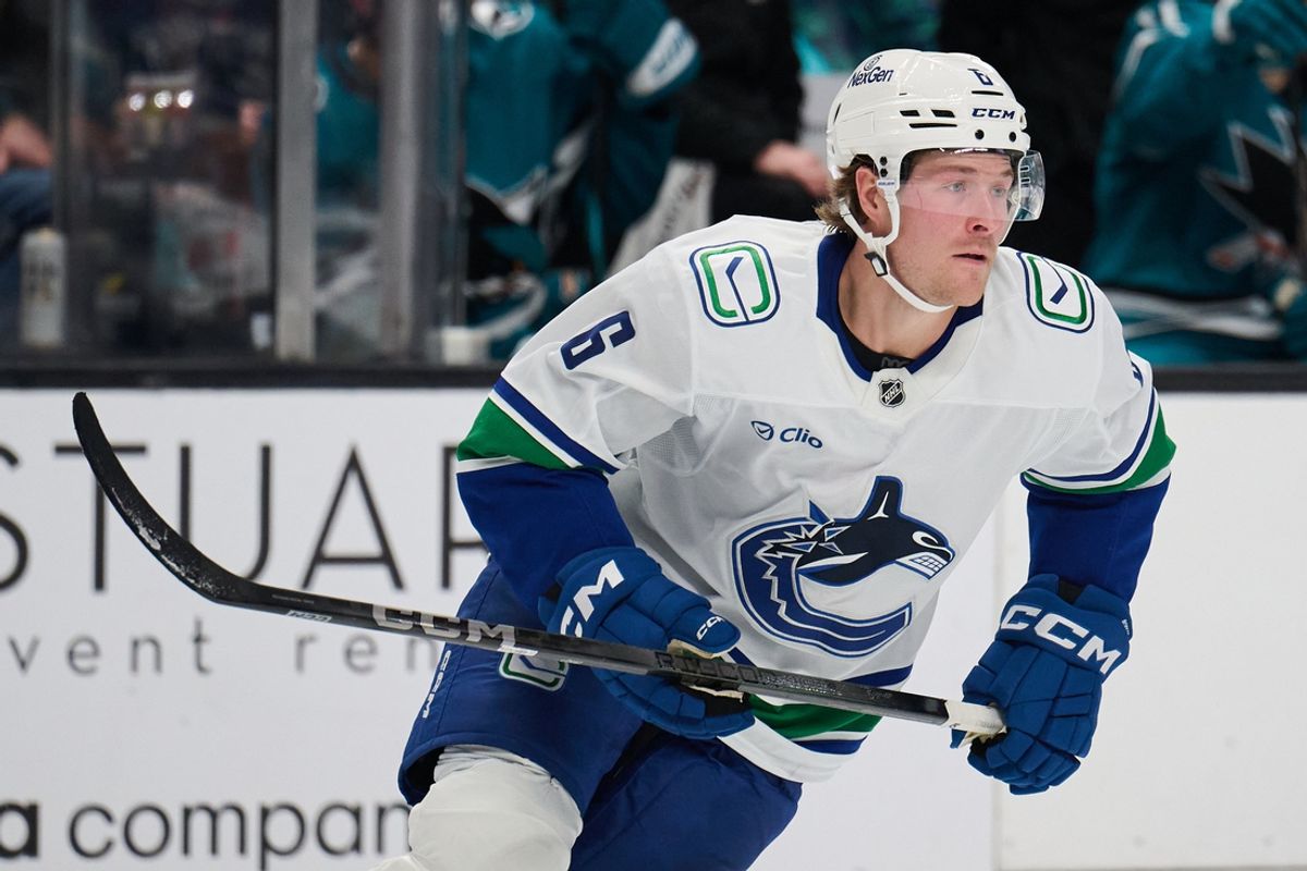 Nov 2, 2024; San Jose, California, USA; Vancouver Canucks right wing Brock Boeser (6) skates against the San Jose Sharks during the second period at SAP Center at San Jose. Mandatory Credit: Robert Edwards-Imagn Images
