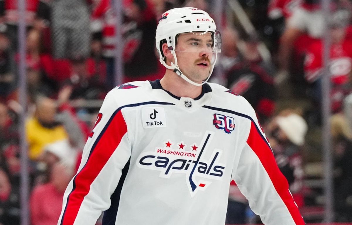 Nov 3, 2024; Raleigh, North Carolina, USA;  Washington Capitals defenseman Dylan McIlrath (52) looks on against the Carolina Hurricanes during the third period at Lenovo Center. Mandatory Credit: James Guillory-Imagn Images