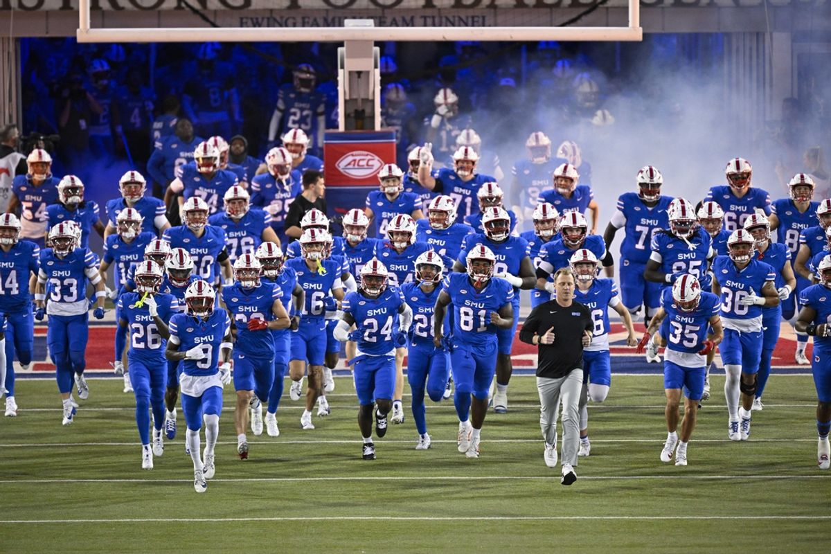 Southern Methodist Mustangs head coach Rhett Lashlee leads SMU on to the field before the game between the Southern Methodist Mustangs and the Pittsburgh Panthers at Gerald J. Ford Stadium. Mandatory Credit: Jerome Miron-Imagn Images