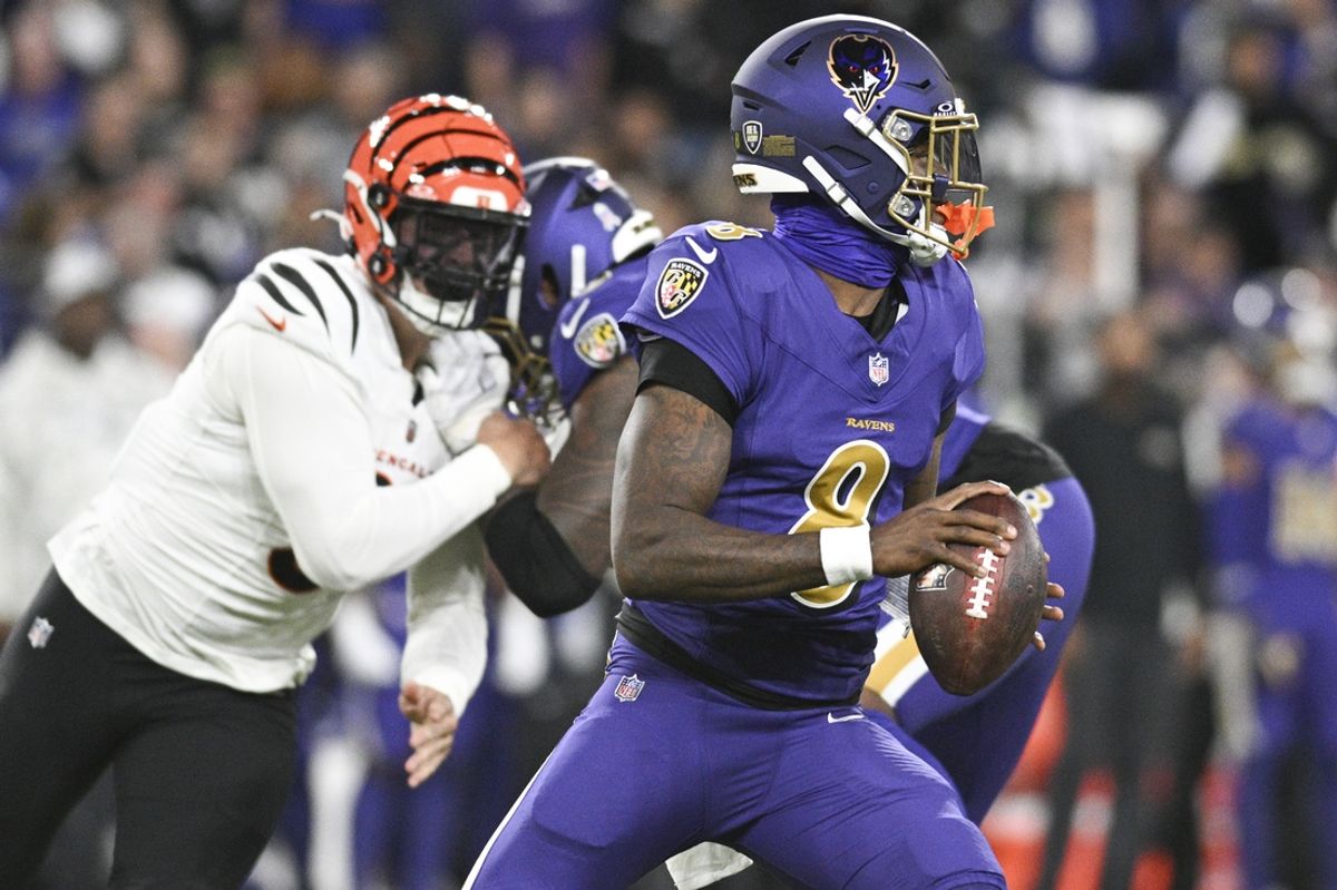 Nov 7, 2024; Baltimore, Maryland, USA;Baltimore Ravens quarterback Lamar Jackson (8) looks to throw from the pocket  during the first quarter  against the Cincinnati Bengals at M&T Bank Stadium. Mandatory Credit: Tommy Gilligan-Imagn Images