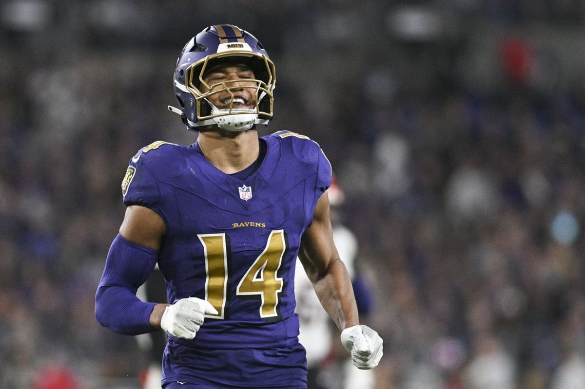 Nov 7, 2024; Baltimore, Maryland, USA; Baltimore Ravens safety Kyle Hamilton (14) reacts after tips a Cincinnati Bengals quarterback Joe Burrow (9) pass during the first quarter  at M&T Bank Stadium. Mandatory Credit: Tommy Gilligan-Imagn Images