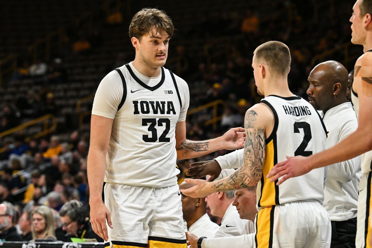 Nov 7, 2024; Iowa City, Iowa, USA; Iowa Hawkeyes forward Owen Freeman (32) reacts with teammates during the second half against the Southern University Jaguars at Carver-Hawkeye Arena. Mandatory Credit: Jeffrey Becker-Imagn Images