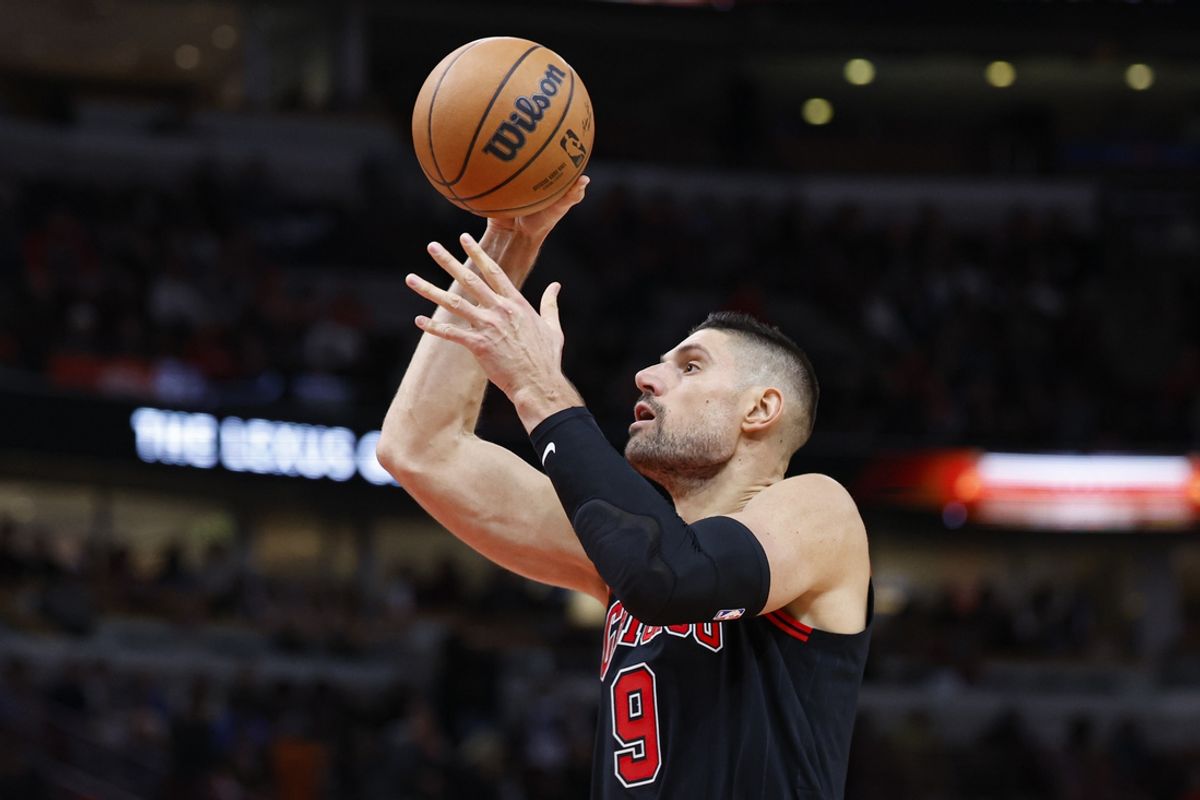 Nov 7, 2024; Chicago, Illinois, USA; Chicago Bulls center Nikola Vucevic (9) shoots against the Minnesota Timberwolves during the second half at United Center. Mandatory Credit: Kamil Krzaczynski-Imagn Images