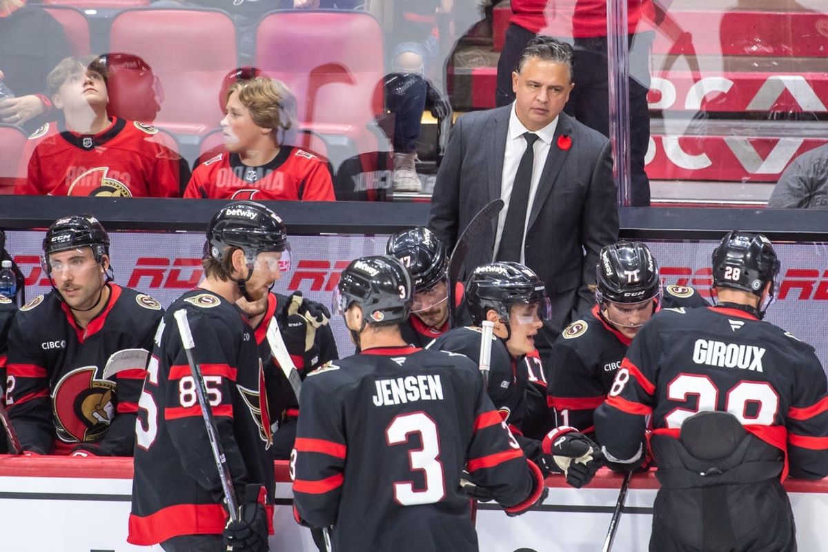 Nov 7, 2024; Ottawa, Ontario, CAN; Ottawa Senators head coach Travis Green looks over at his players during a break in the third period against the New York Islanders at the Canadian Tire Centre. Mandatory Credit: Marc DesRosiers-Imagn Images