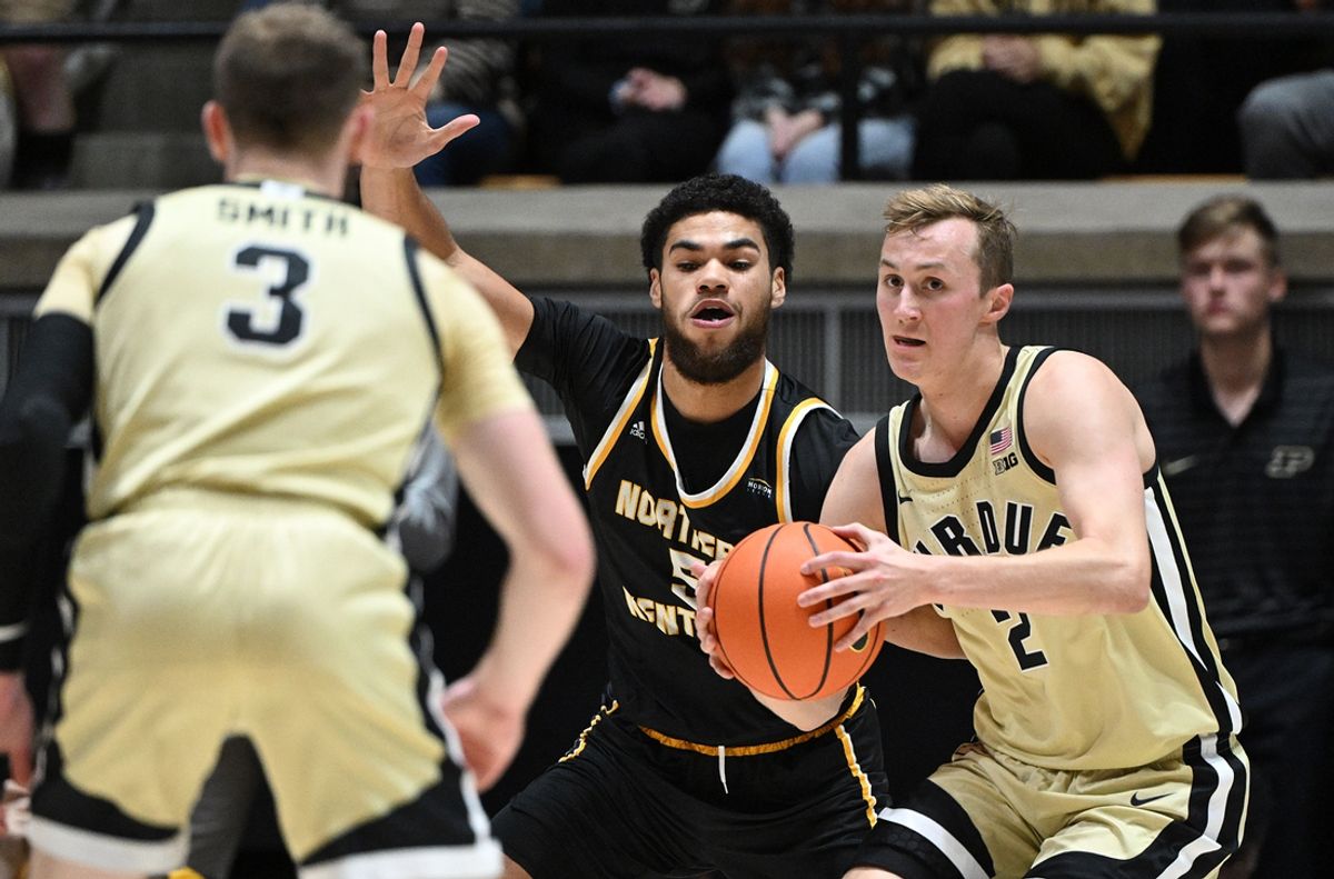 Nov 8, 2024; West Lafayette, Indiana, USA; Purdue Boilermakers guard Fletcher Loyer (2) looks to pass against  Northern Kentucky Norse forward LJ Wells (5) during the first half at Mackey Arena. Mandatory Credit: Marc Lebryk-Imagn Images