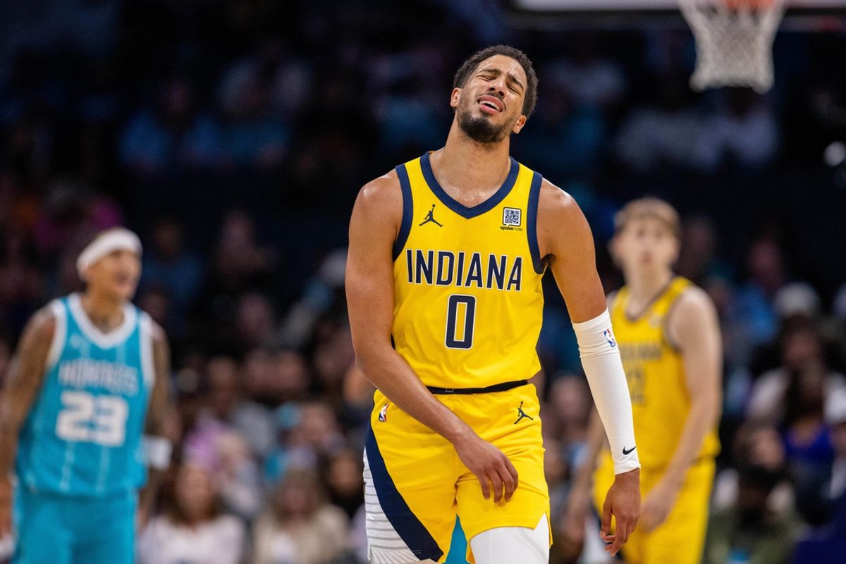 Nov 8, 2024; Charlotte, North Carolina, USA; Indiana Pacers guard Tyrese Haliburton (0) reacts at the end of the first quarter against the Charlotte Hornets at Spectrum Center. Mandatory Credit: Scott Kinser-Imagn Images