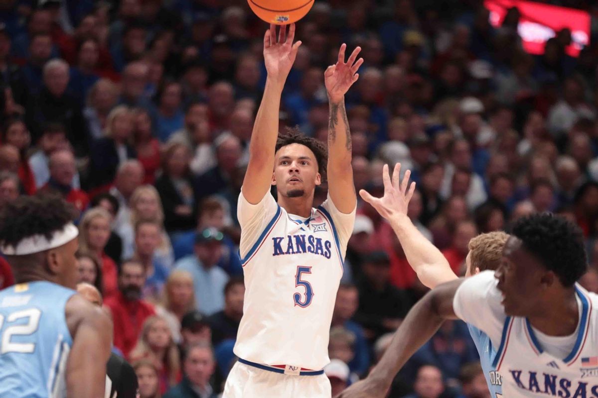Kansas Jayhawks guard Zeke Mayo (5) shoots for three against North Carolina Tar Heels in the first half of the game inside Allen Fieldhouse Friday, Nov. 8, 2024.