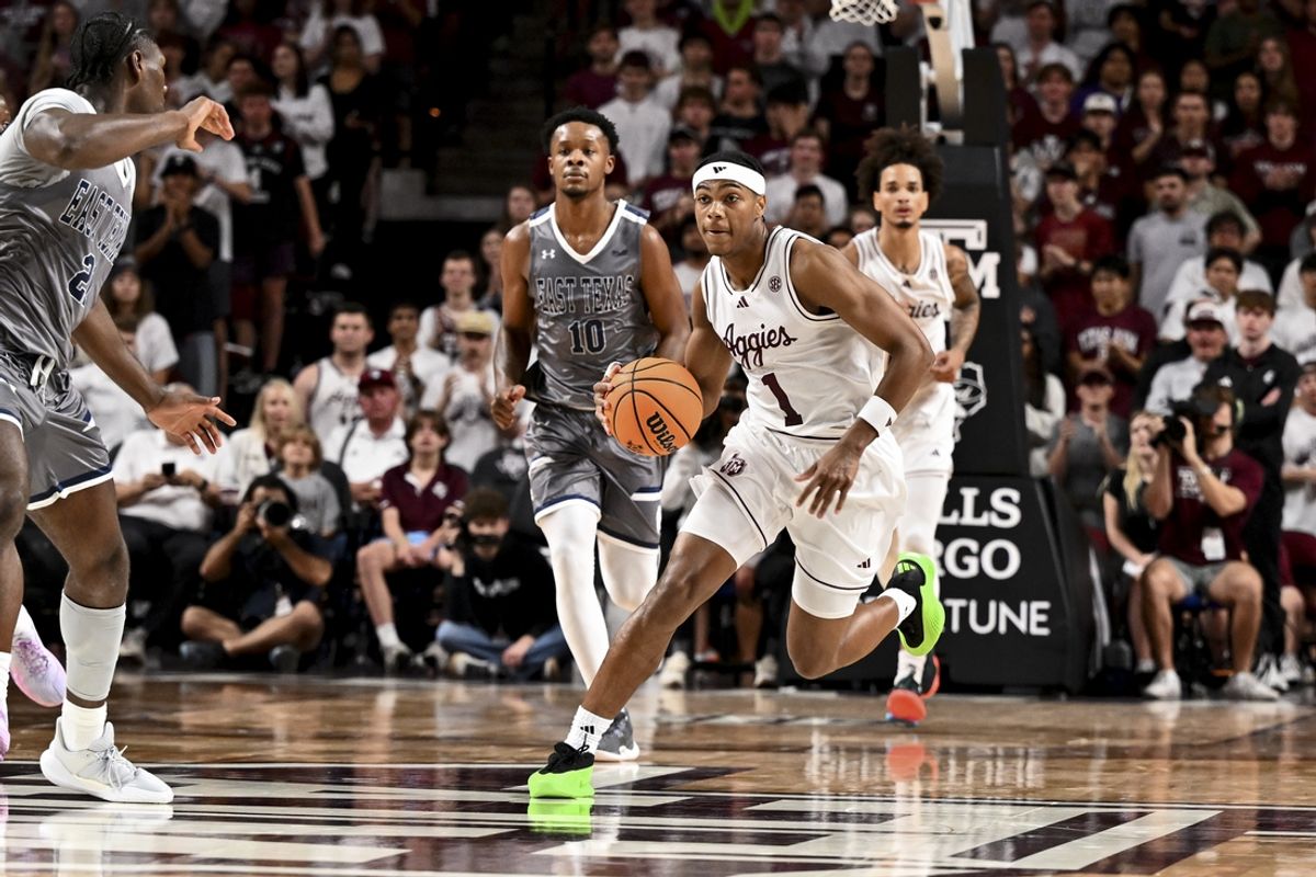 Nov 8, 2024; College Station, Texas, USA; Texas A&M Aggies guard Zhuric Phelps (1) dribbles the ball against the East Texas A&M during the first half at Reed Arena. Mandatory Credit: Maria Lysaker-Imagn Images
