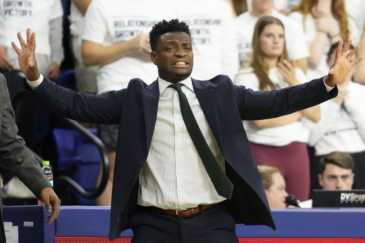Nov 8, 2024; Milwaukee, Wisconsin, USA;  George Mason Patriots head coach Tony Skinn signals to his players during the first half against the Marquette Golden Eagles at Al McGuire Center. Mandatory Credit: Jeff Hanisch-Imagn Images