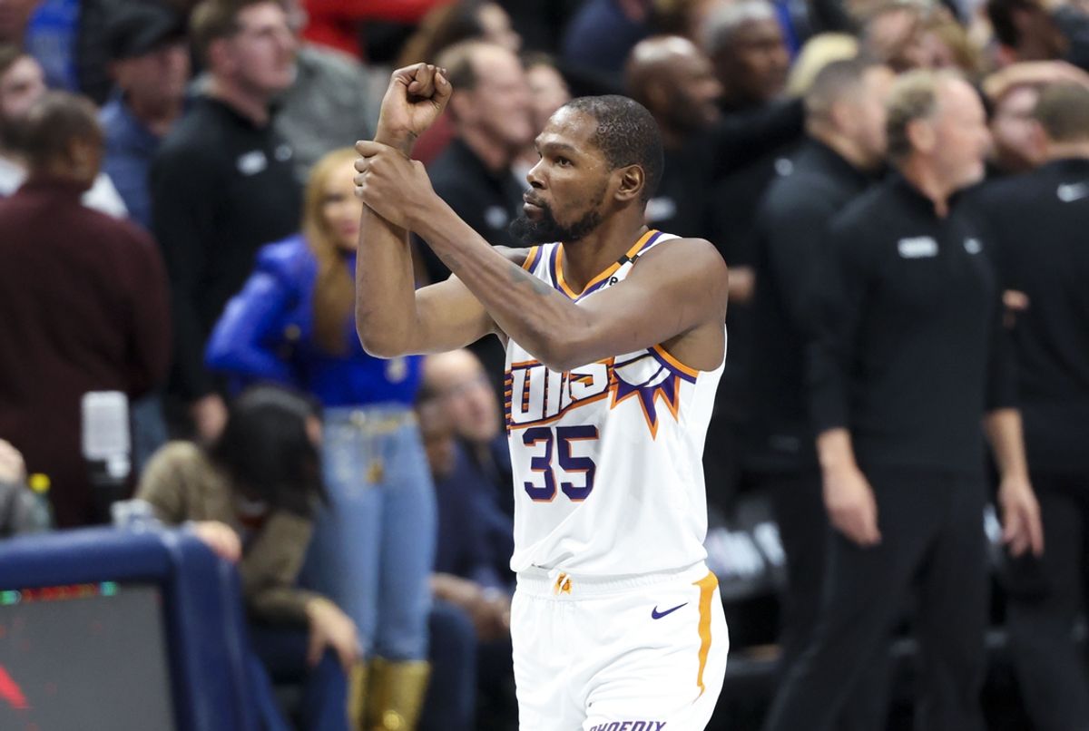 Nov 8, 2024; Dallas, Texas, USA;  Phoenix Suns forward Kevin Durant (35) reacts to a foul call during the fourth quarter against the Dallas Mavericks at American Airlines Center. Mandatory Credit: Kevin Jairaj-Imagn Images