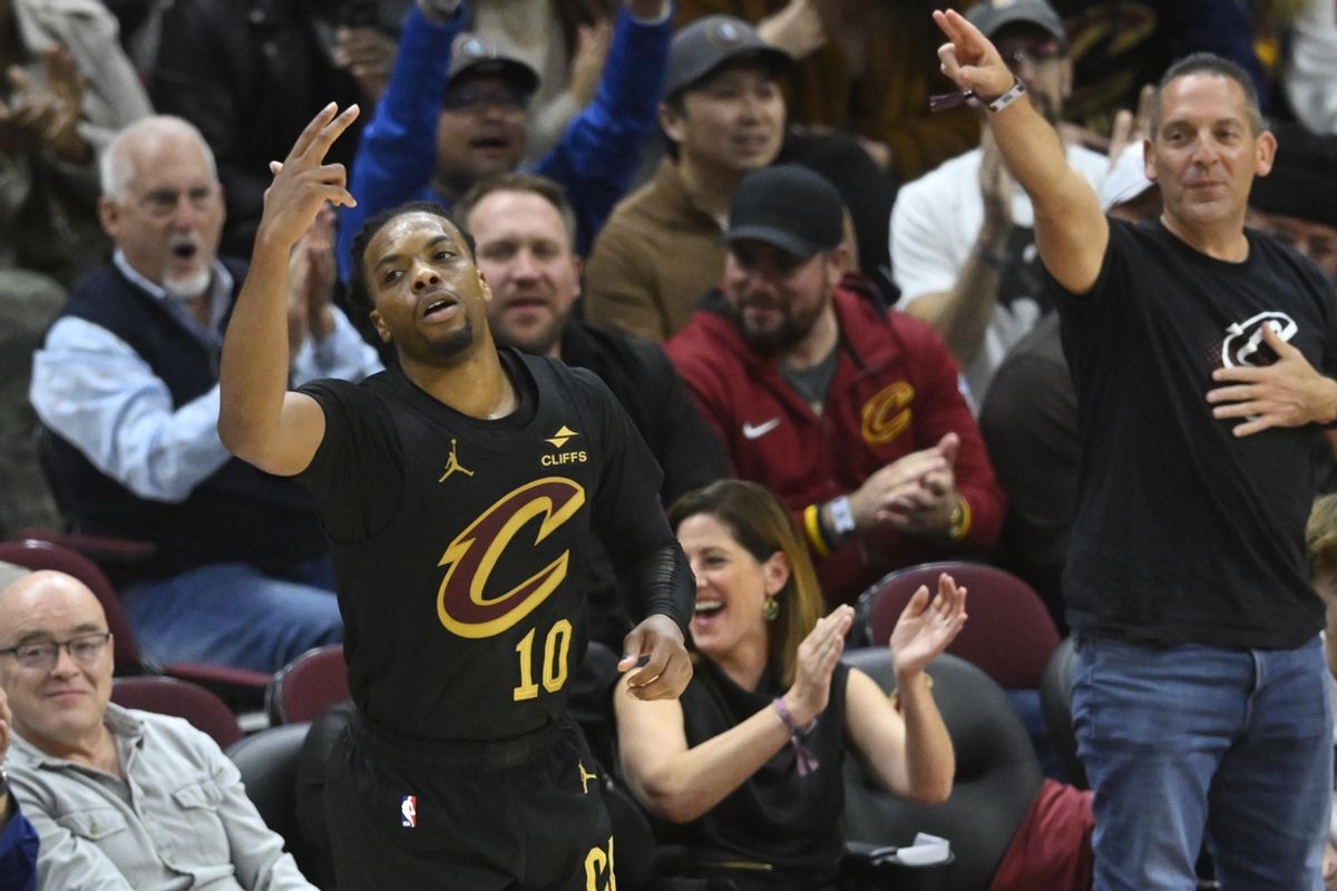 Nov 8, 2024; Cleveland, Ohio, USA; Cleveland Cavaliers guard Darius Garland (10) celebrates a three-point basket in the fourth quarter against the Golden State Warriors at Rocket Mortgage FieldHouse. Mandatory Credit: David Richard-Imagn