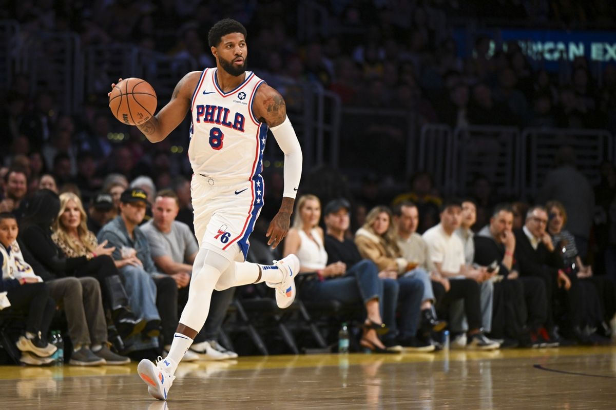 Nov 8, 2024; Los Angeles, California, USA; Philadelphia 76ers forward Paul George (8) dribbles against the Los Angeles Lakers during the first half at Crypto.com Arena. Mandatory Credit: Jonathan Hui-Imagn Images