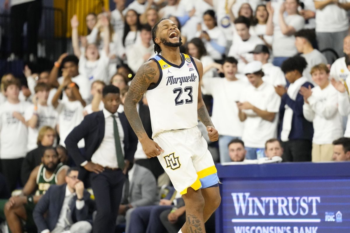 Nov 8, 2024; Milwaukee, Wisconsin, USA;  Marquette Golden Eagles forward David Joplin (23) celebrates after scoring a basket during the second half against the George Mason Patriots at Al McGuire Center. Mandatory Credit: Jeff Hanisch-Imagn Images