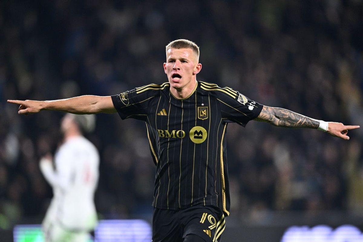 Nov 8, 2024; Los Angeles, California, USA; LAFC midfielder Mateusz Bogusz (19) celebrates after scoring a goal against Vancouver Whitecaps FC in the second half in a 2024 MLS Cup Playoffs Round One match at BMO Stadium. Mandatory Credit: Kelvin Kuo-Imagn Images