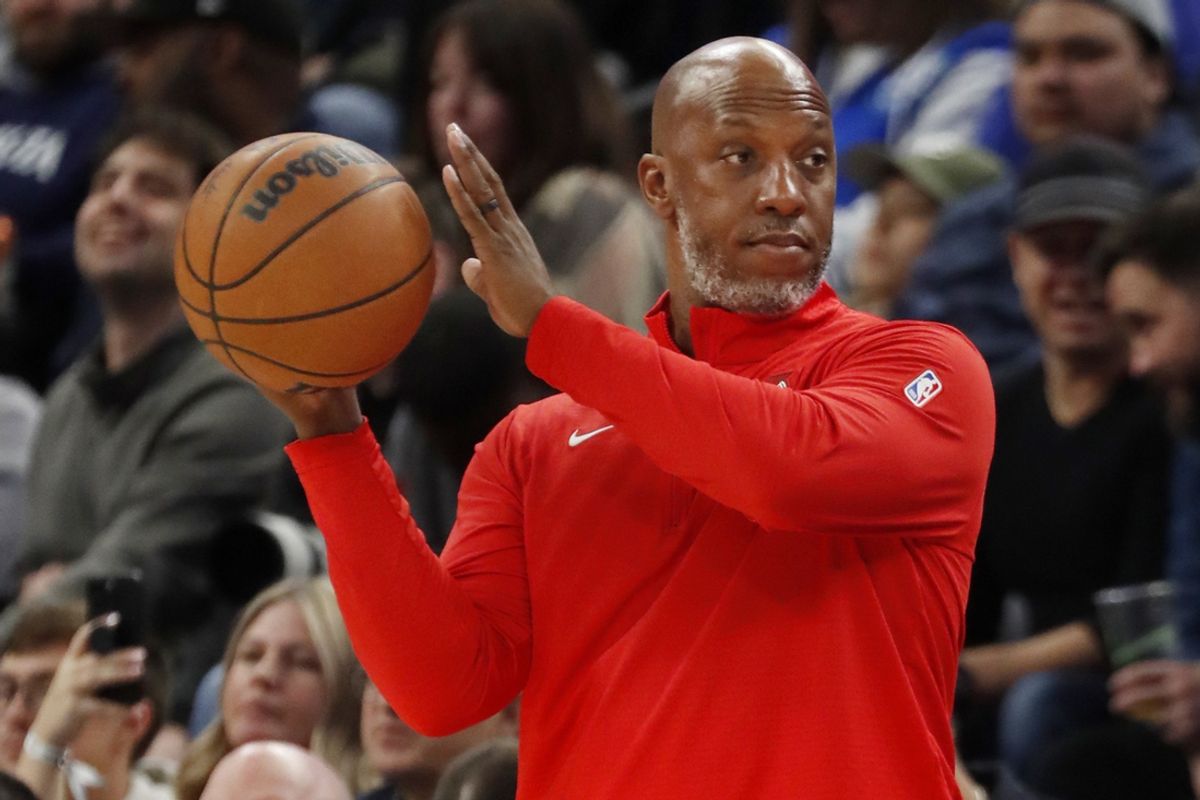 Nov 8, 2024; Minneapolis, Minnesota, USA; Portland Trail Blazers head coach Chauncey Billups returns a ball during the third quarter against the Minnesota Timberwolves at Target Center. Mandatory Credit: Bruce Kluckhohn-Imagn Images