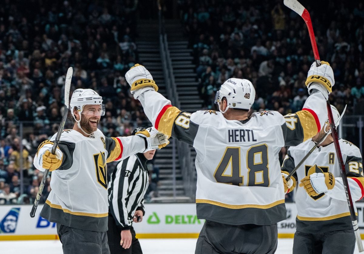 Nov 8, 2024; Seattle, Washington, USA;  Vegas Golden Knights defenseman Alex Pietrangelo (7), left, forward Tomas Hertl (48) and defenseman Shea Theodore (27) celebrate a goald during the third period against the Seattle Kraken at Climate Pledge Arena. Mandatory Credit: Stephen Brashear-Imagn Images