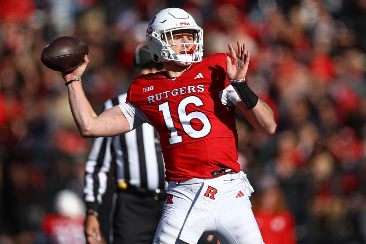 Nov 9, 2024; Piscataway, New Jersey, USA; Rutgers Scarlet Knights quarterback Athan Kaliakmanis (16) throws a touchdown pass during the first half against the Minnesota Golden Gophers at SHI Stadium. Mandatory Credit: Vincent Carchietta-Imagn Images