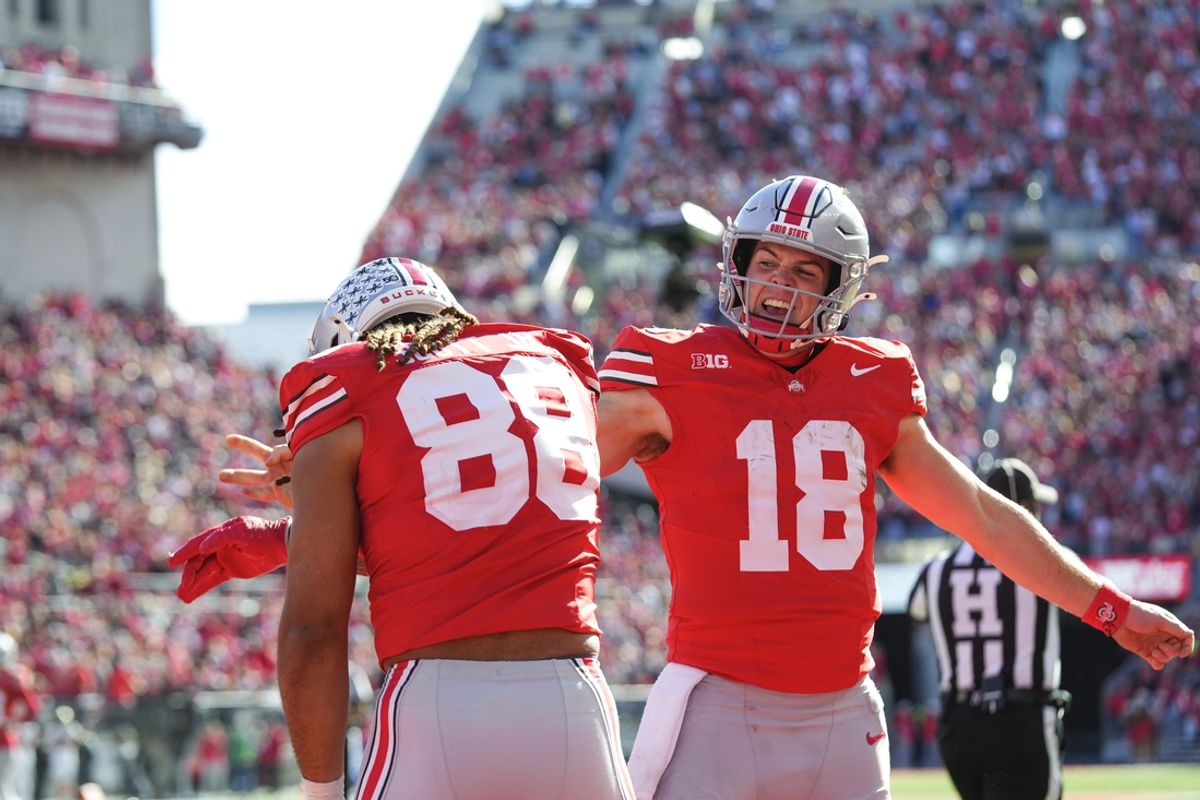 Nov 9, 2024; Columbus, Ohio, USA; Ohio State Buckeyes quarterback Will Howard (18) celebrates with tight end Gee Scott Jr. (88) after Scott scored a touchdown in the first half against the Purdue Boilermakers at Ohio Stadium. Mandatory Credit: Samantha Madar-Imagn Images