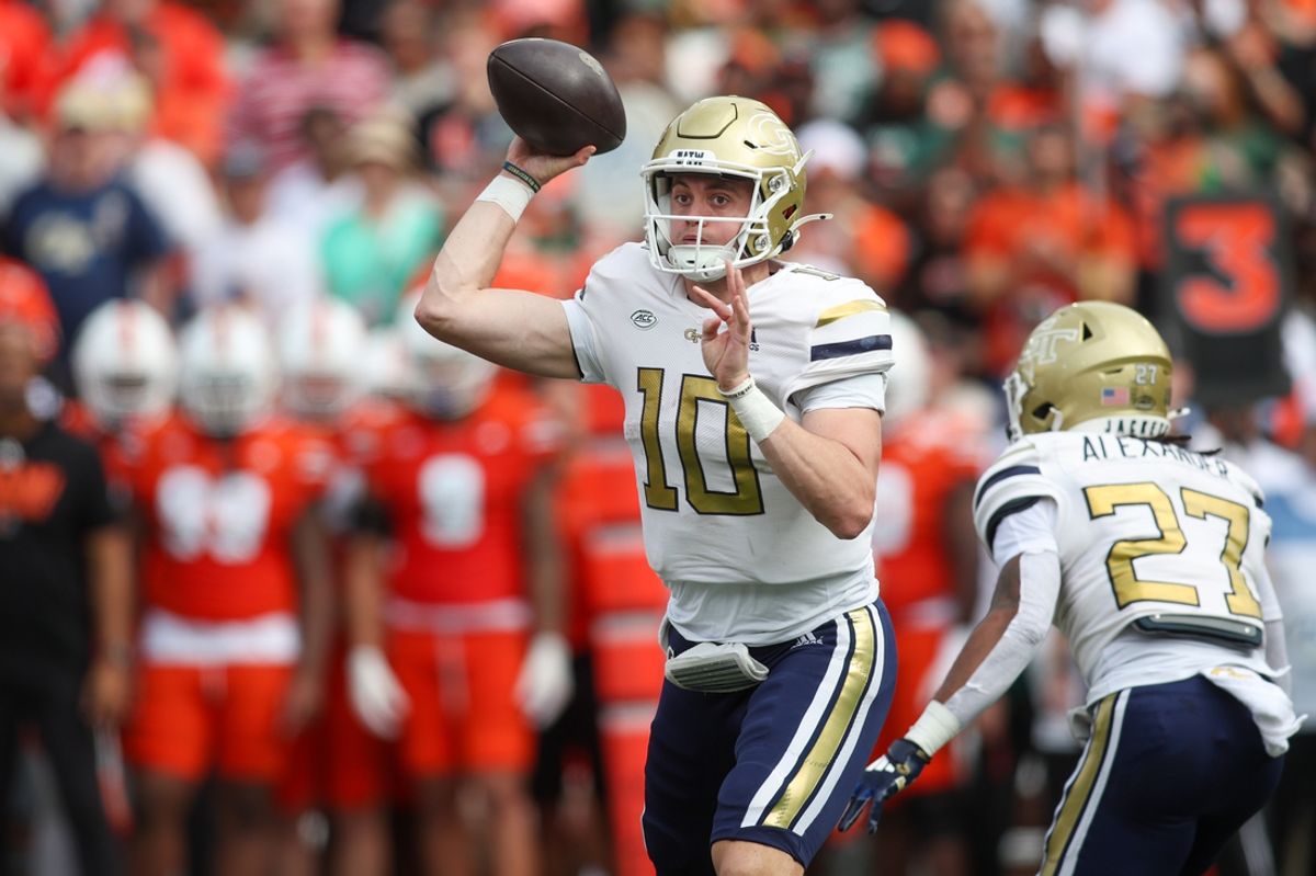Nov 9, 2024; Atlanta, Georgia, USA; Georgia Tech Yellow Jackets quarterback Haynes King (10) throws a pass against the Miami Hurricanes in the second quarter at Bobby Dodd Stadium at Hyundai Field. Mandatory Credit: Brett Davis-Imagn Images