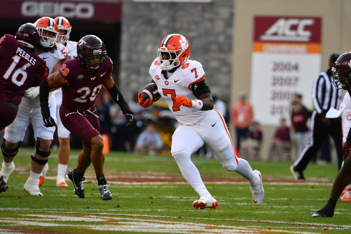 Nov 9, 2024; Blacksburg, Virginia, USA;  Clemson Tigers running back Phil Mafah (7) runs the ball against the Virginia Tech Hokies during the first quarter at Lane Stadium. Mandatory Credit: Brian Bishop-Imagn Images
