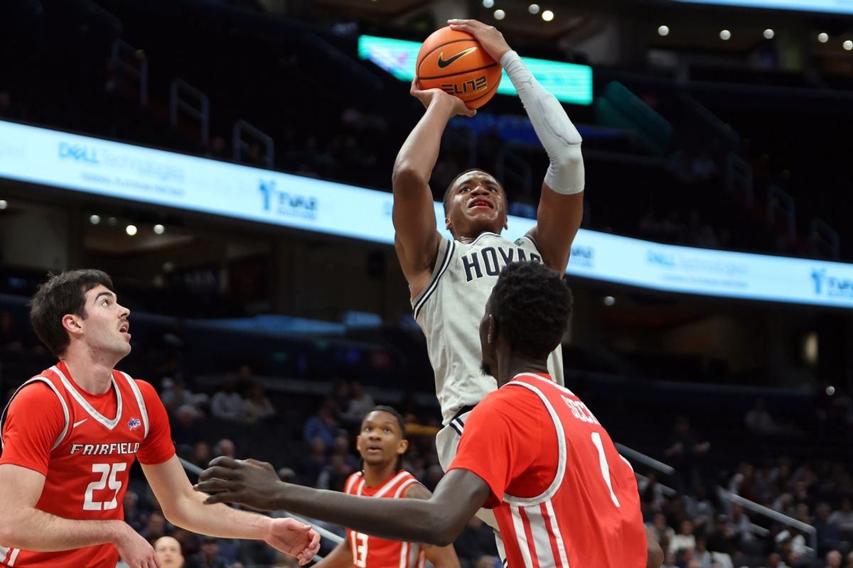 Nov 9, 2024; Washington, District of Columbia, USA; Georgetown Hoyas forward Thomas Sorber (35) takes a shot over Fairfield Stags guard Michael Rogan (25) and Fairfield Stags forward Birima Seck (1) during the first half at Capital One Arena. Mandatory Credit: Daniel Kucin Jr.-Imagn Images