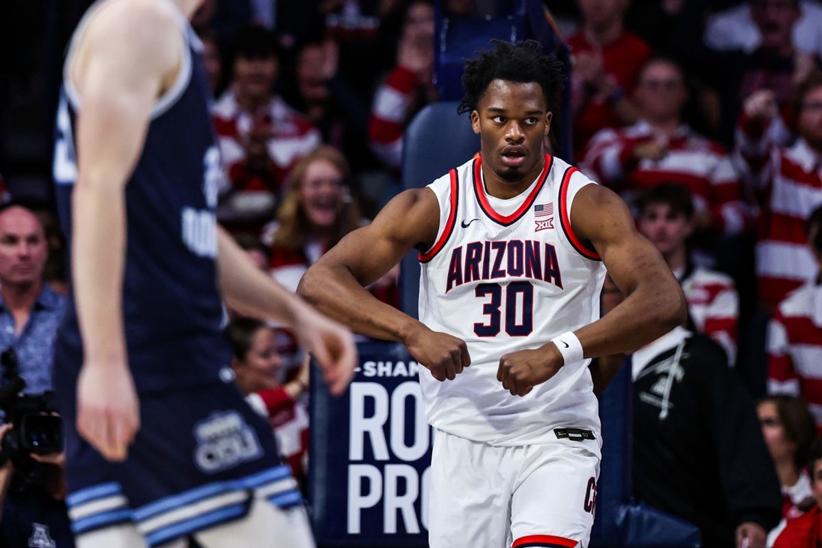 Nov 9, 2024; Tucson, Arizona, USA;  Arizona Wildcats forward Tobe Awaka (30) celebrates his dunk during the first half against the Old Dominion Monarchs at McKale Center. Mandatory Credit: Aryanna Frank-Imagn Images