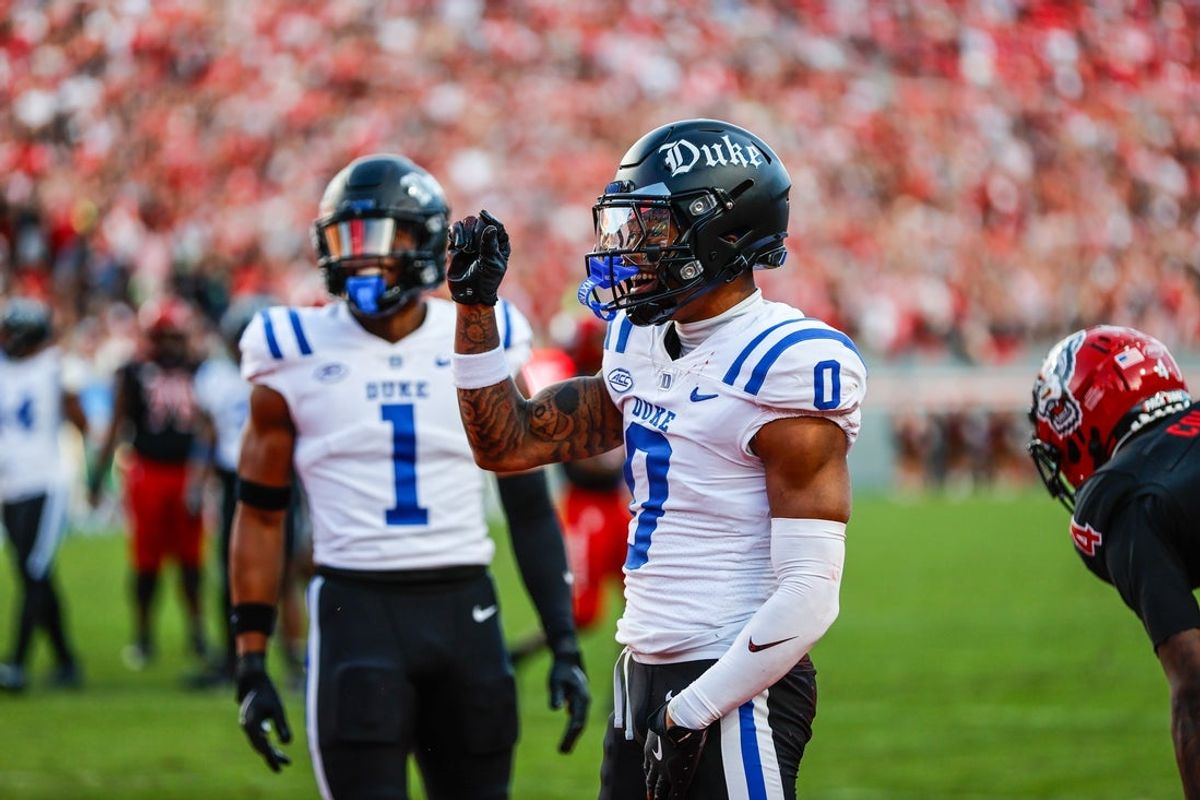 Nov 9, 2024; Raleigh, North Carolina, USA; Duke Blue Devils cornerback Chandler Rivers (0) celebrates a blocked touchdown during the first half of the game against North Carolina State Wolfpack at Carter-Finley Stadium. Mandatory Credit: Jaylynn Nash-Imagn Images