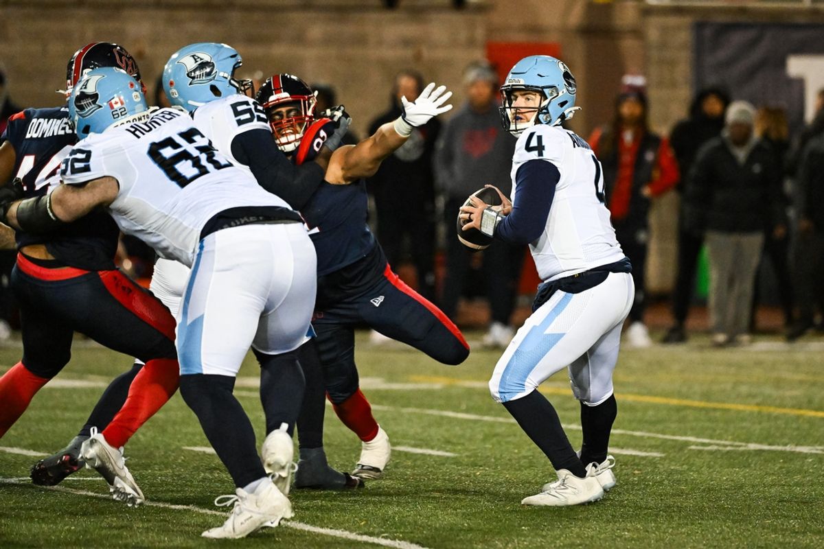 Toronto Argonauts quarterback Nick Arbuckle (4) passes the ball against the Montreal Alouettes during the fourth quarter at Percival-Molson Memorial Stadium. Mandatory Credit: David Kirouac-Imagn Images