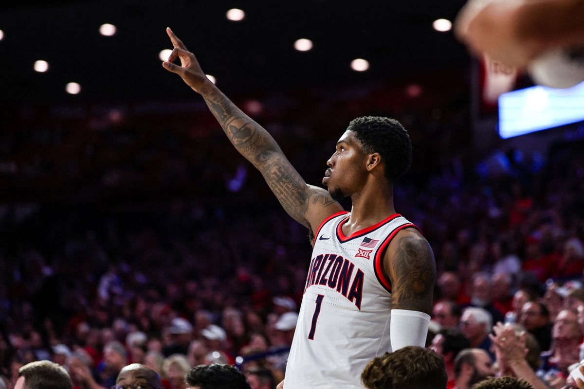 Nov 9, 2024; Tucson, Arizona, USA; Arizona Wildcats guard Caleb Love (1) holds up the number three as the Arizona Wildcats just made a three-point basket during the second half against the Old Dominion Monarchs at McKale Center. Mandatory Credit: Aryanna Frank-Imagn Images