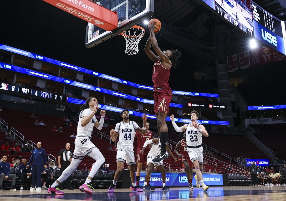 Nov 9, 2024; Houston, Texas, USA; Florida State Seminoles guard Jamir Watkins (1) shoots the ball during the first half against the Rice Owls at Toyota Center. Mandatory Credit: Troy Taormina-Imagn Images