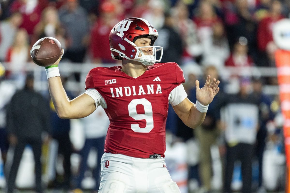 Nov 9, 2024; Bloomington, Indiana, USA; Indiana Hoosiers quarterback Kurtis Rourke (9) passes the ball in the second half against the Michigan Wolverines at Memorial Stadium. Mandatory Credit: Trevor Ruszkowski-Imagn Images