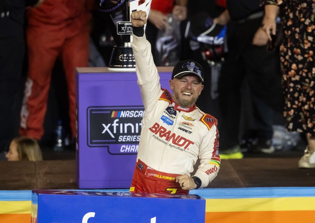 Nov 9, 2024; Avondale, Arizona, USA; NASCAR Xfinity Series driver Justin Allgaier celebrates after winning the 2024 Xfinity Series championship during the Championship race at Phoenix Raceway. Mandatory Credit: Mark J. Rebilas-Imagn Images