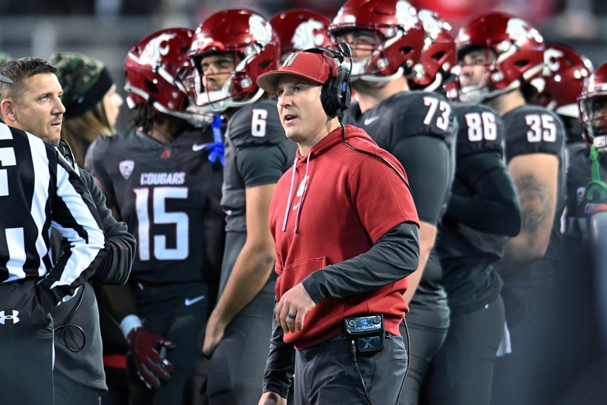 Nov 9, 2024; Pullman, Washington, USA; Washington State Cougars head coach Jake Dickert watches the video board during a game against the Utah State Aggies in the first half at Gesa Field at Martin Stadium. Mandatory Credit: James Snook-Imagn Images