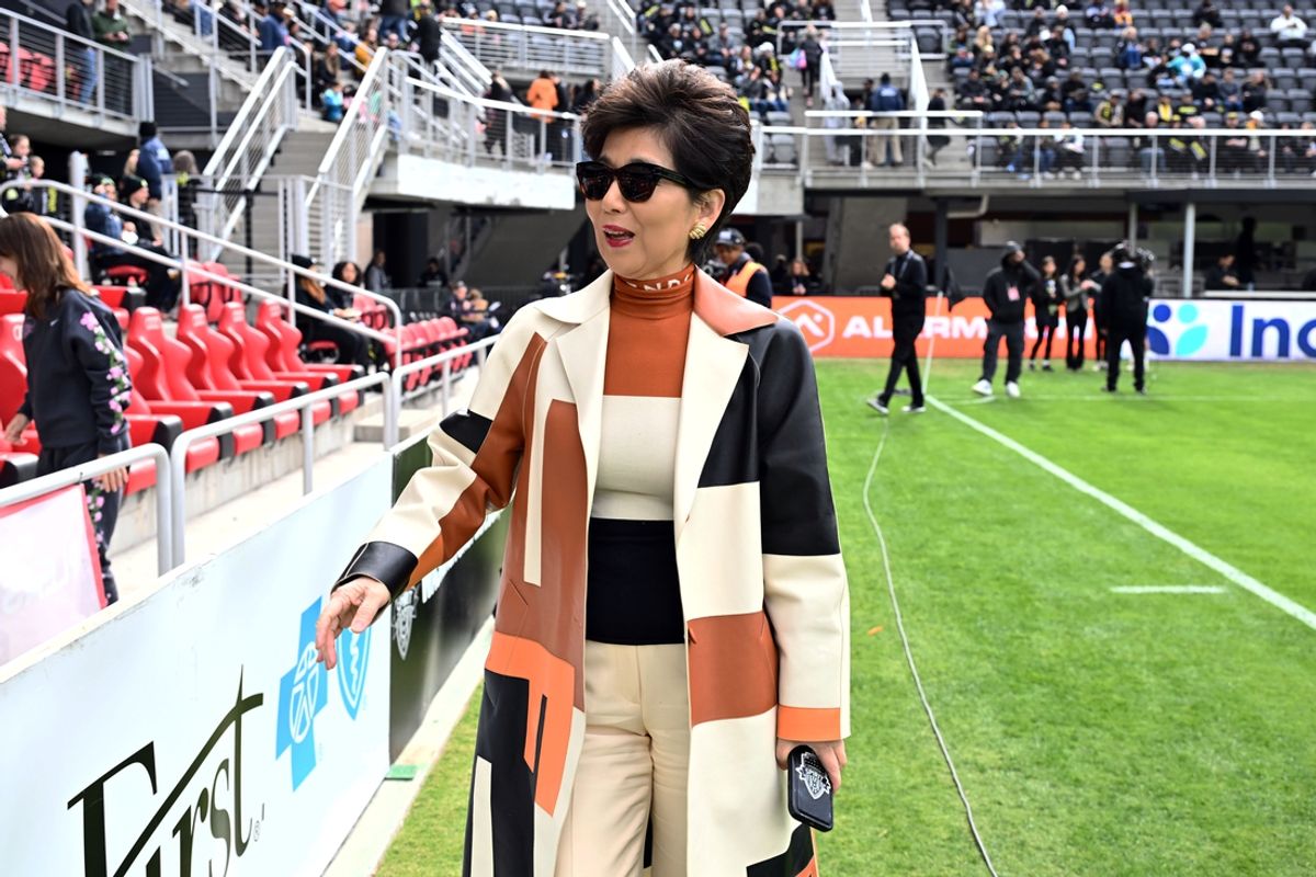 Nov 10, 2024; Washington, District of Columbia, USA; Washington Spirit team owner Michele Kang looks on from the field before a 2024 NWSL Playoffs quarterfinal match against Bay FC at Audi Field. Mandatory Credit: James A. Pittman-Imagn Images