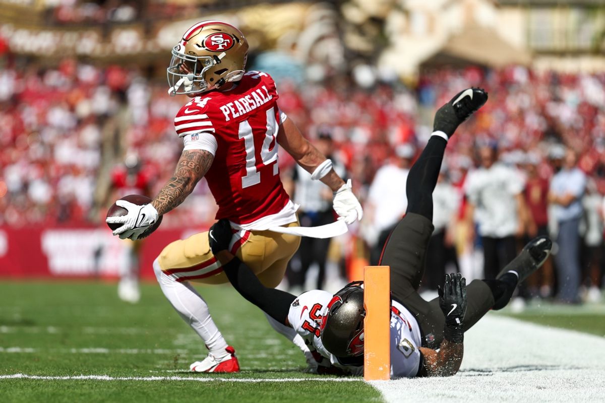 Nov 10, 2024; Tampa, Florida, USA; San Francisco 49ers wide receiver Ricky Pearsall (14) score a touchdown past Tampa Bay Buccaneers safety Antoine Winfield Jr. (31) in the first quarter at Raymond James Stadium. Mandatory Credit: Nathan Ray Seebeck-Imagn Images