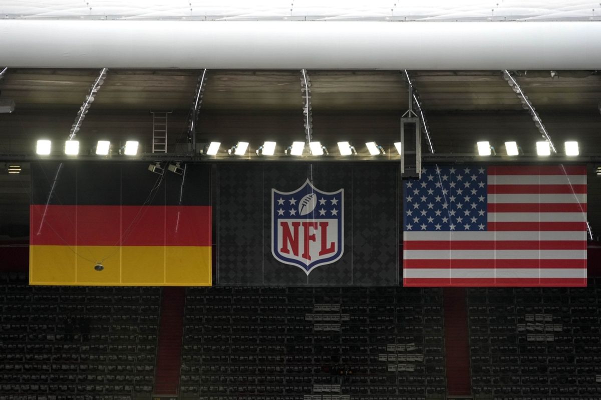 Nov 10, 2024; Munich, Germany; German, NFL shield and United States flags during the 2024 NFL Munich Game at Allianz Arena. Mandatory Credit: Kirby Lee-Imagn Images
