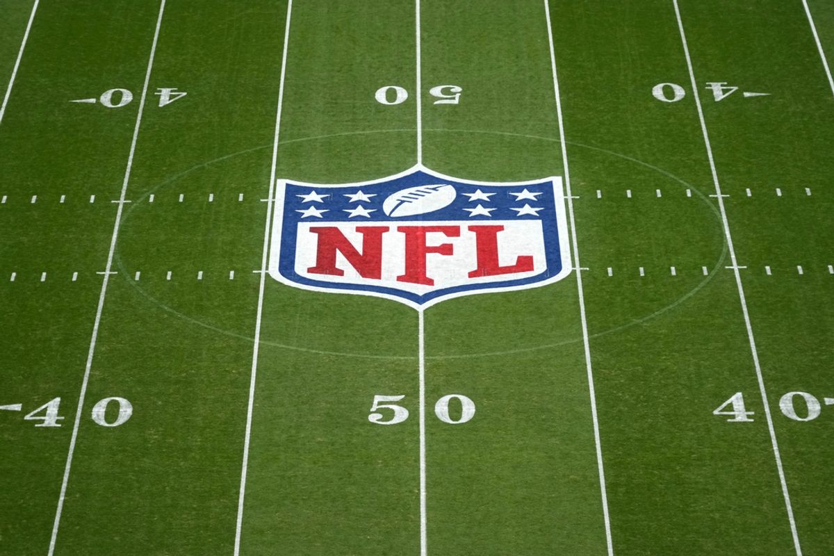 Nov 10, 2024; Munich, Germany; The NFL shield logo at midfield during the 2024 NFL Munich Game at Allianz Arena. Mandatory Credit: Kirby Lee-Imagn Images