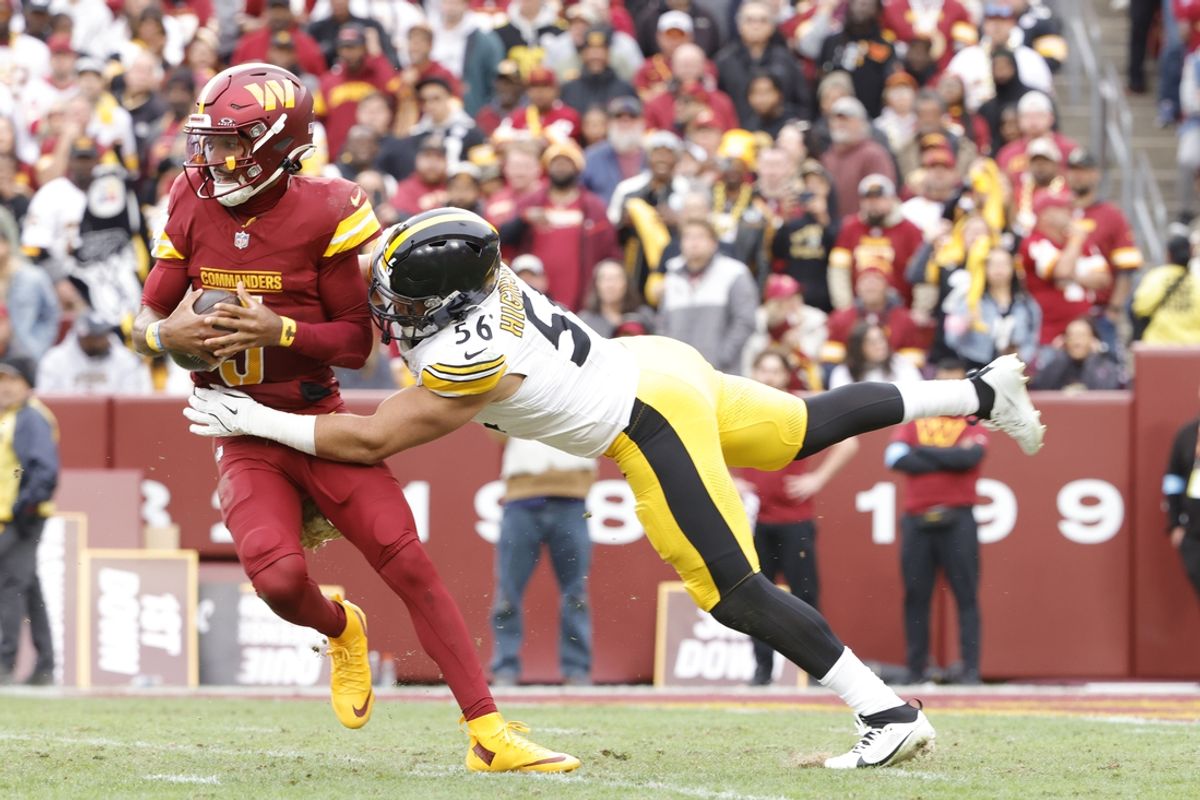 Nov 10, 2024; Landover, Maryland, USA; Pittsburgh Steelers linebacker Alex Highsmith (56) sacks Washington Commanders quarterback Jayden Daniels (5) during the first half at Northwest Stadium. Mandatory Credit: Amber Searls-Imagn Images