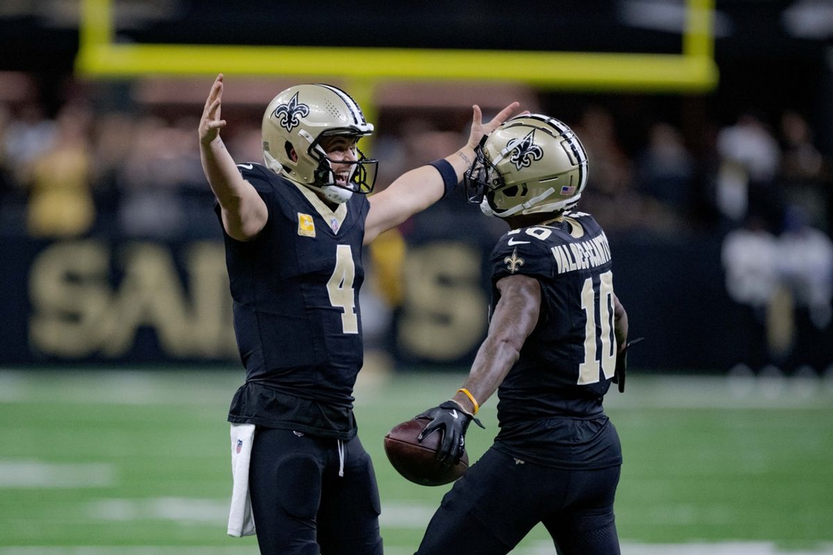Nov 10, 2024; New Orleans, Louisiana, USA; New Orleans Saints wide receiver Marquez Valdes-Scantling (10) celebrates a touchdown with New Orleans Saints quarterback Derek Carr (4) against the Atlanta Falcons during the first half at Caesars Superdome. Mandatory Credit: Matthew Hinton-Imagn Images